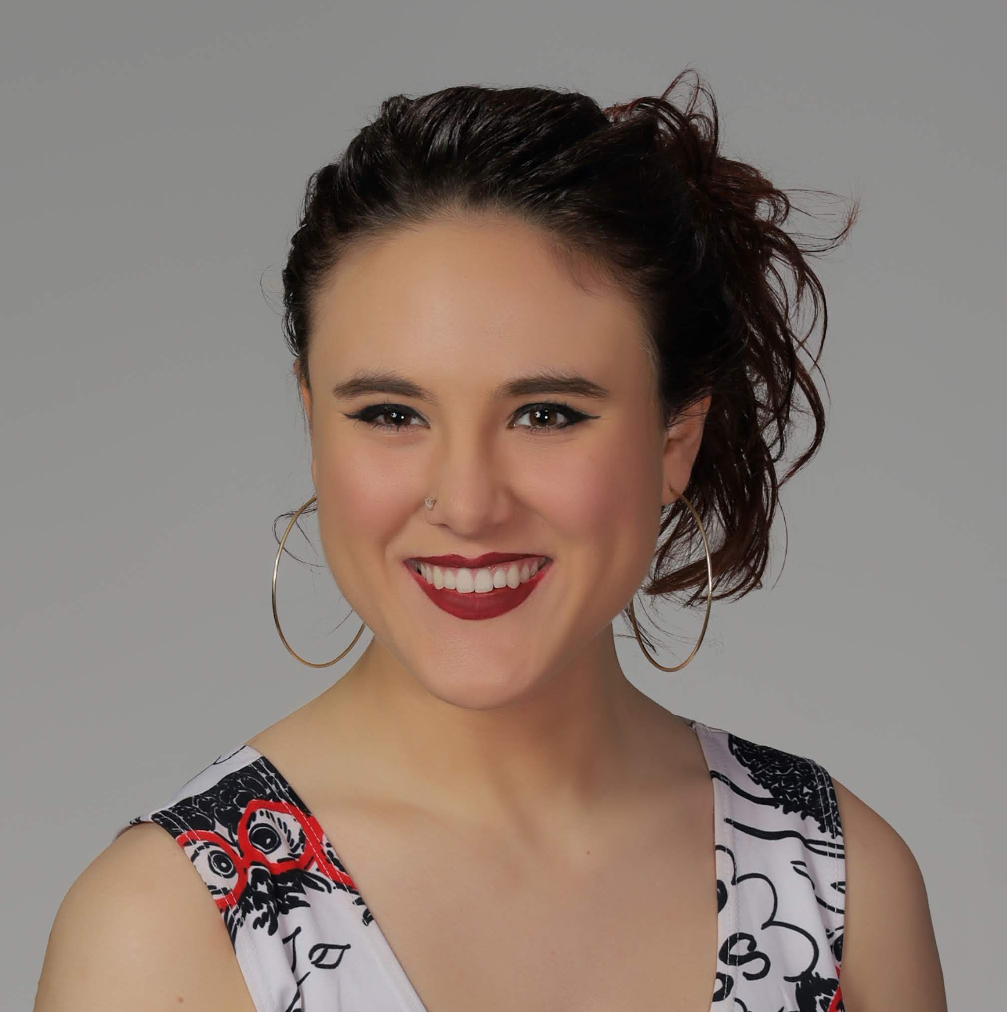 Headshot of a feminine person